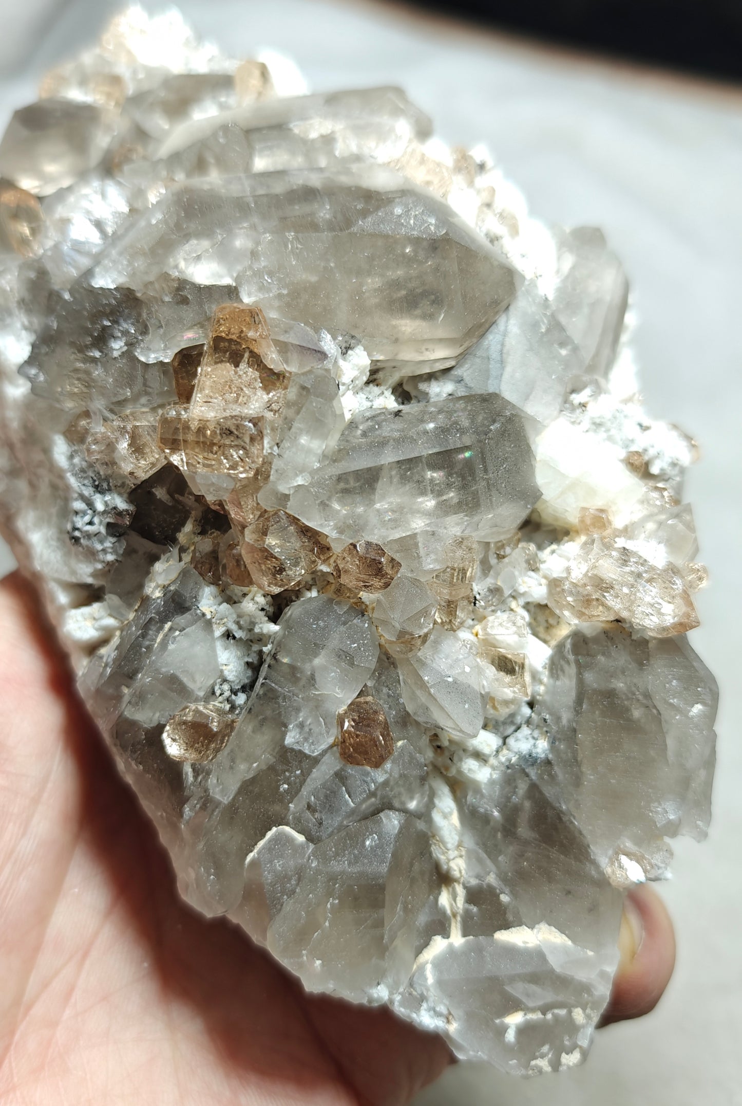 Natural terminated peach color Topaz crystals with smoky quartz on matrix 750 grams