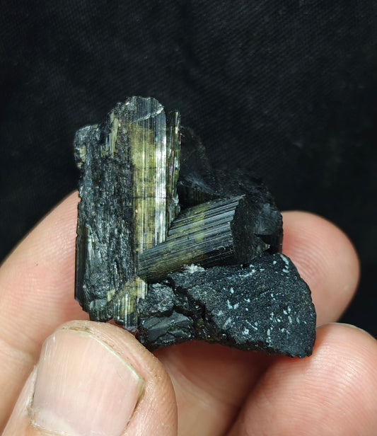 Dark green color Tourmaline with chatoyance effect 19 grams