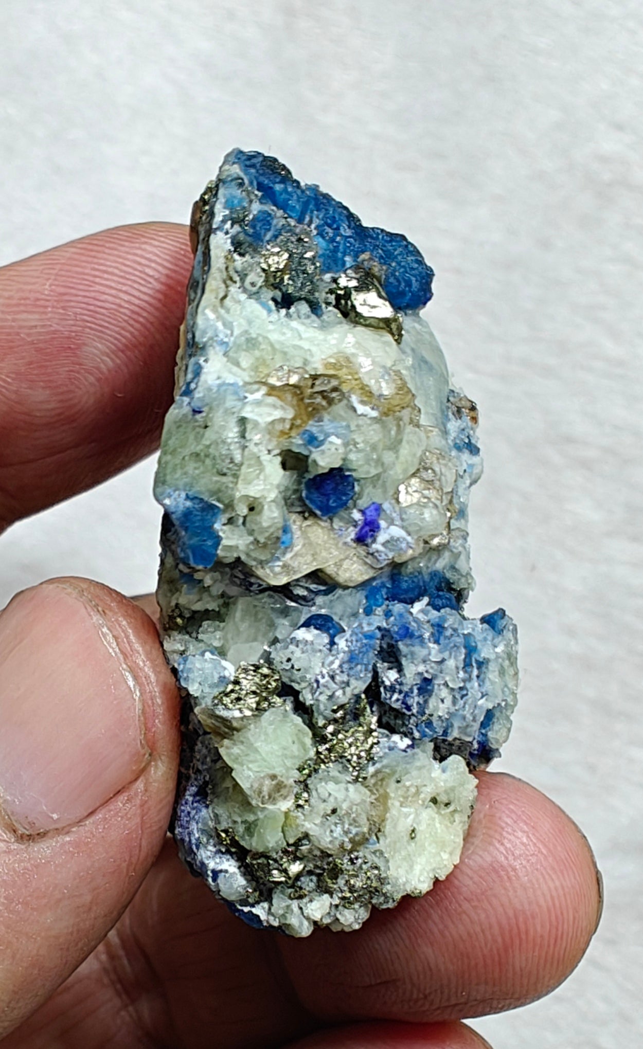 Afghanite Fluorescent in matrix with some pyrite and phlogopite 41 grams