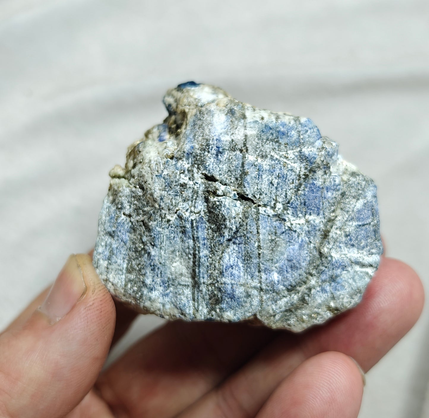 Afghanite Fluorescent in matrix with some pyrite 190 grams