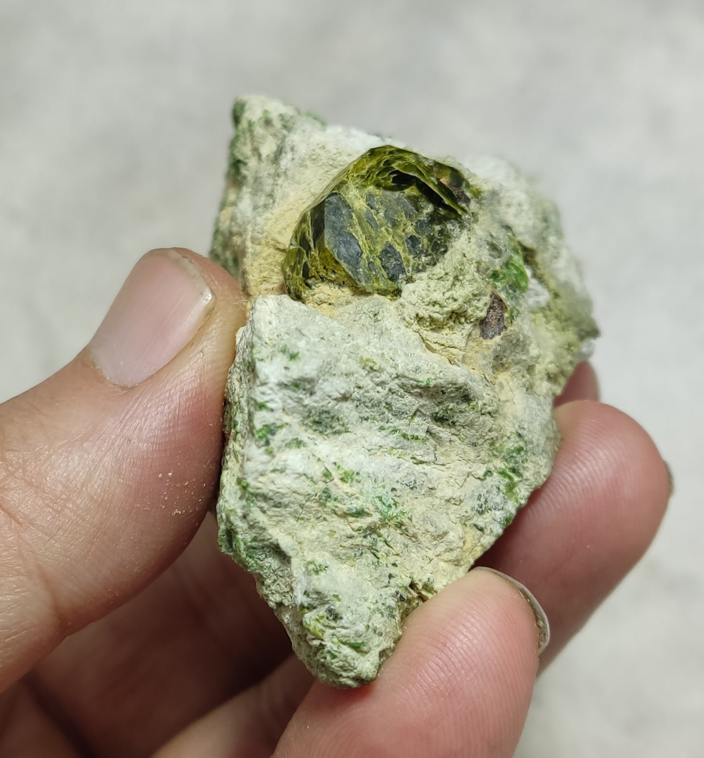 An Aesthetic specimen of garnet variety demantoid crystal On Matrix 140  grams