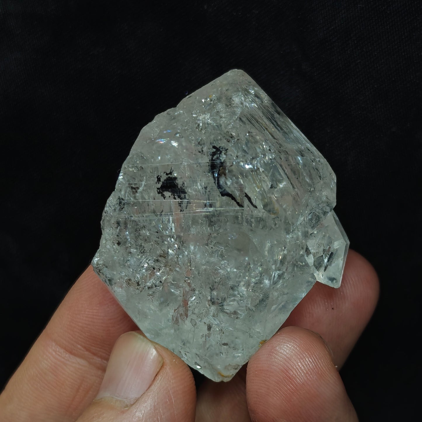 double terminated diamond like quartz crystal with carbon inclusions 57 grams