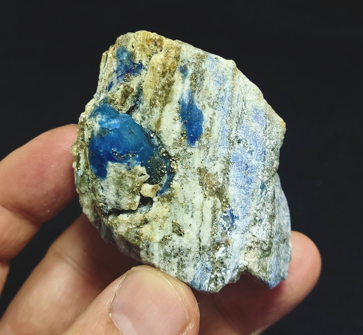 Afghanite Fluorescent in matrix with some pyrite 190 grams