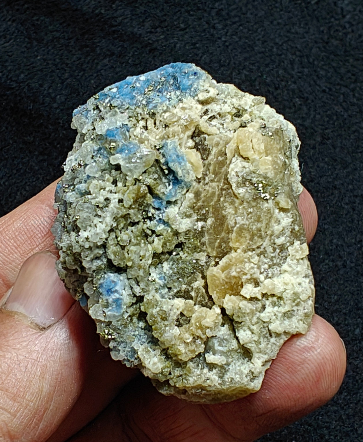 Afghanite Fluorescent in matrix with some pyrite calcite 88 grams