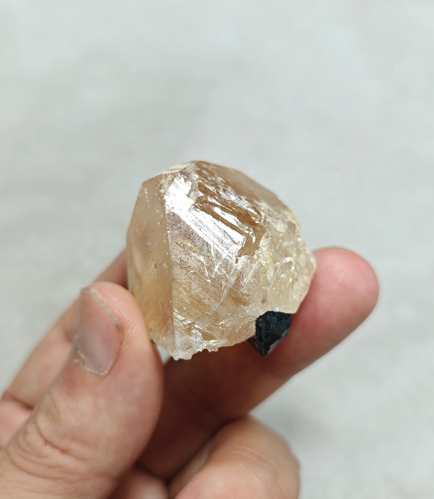 Peach color Topaz crystal with Tourmaline 68 grams