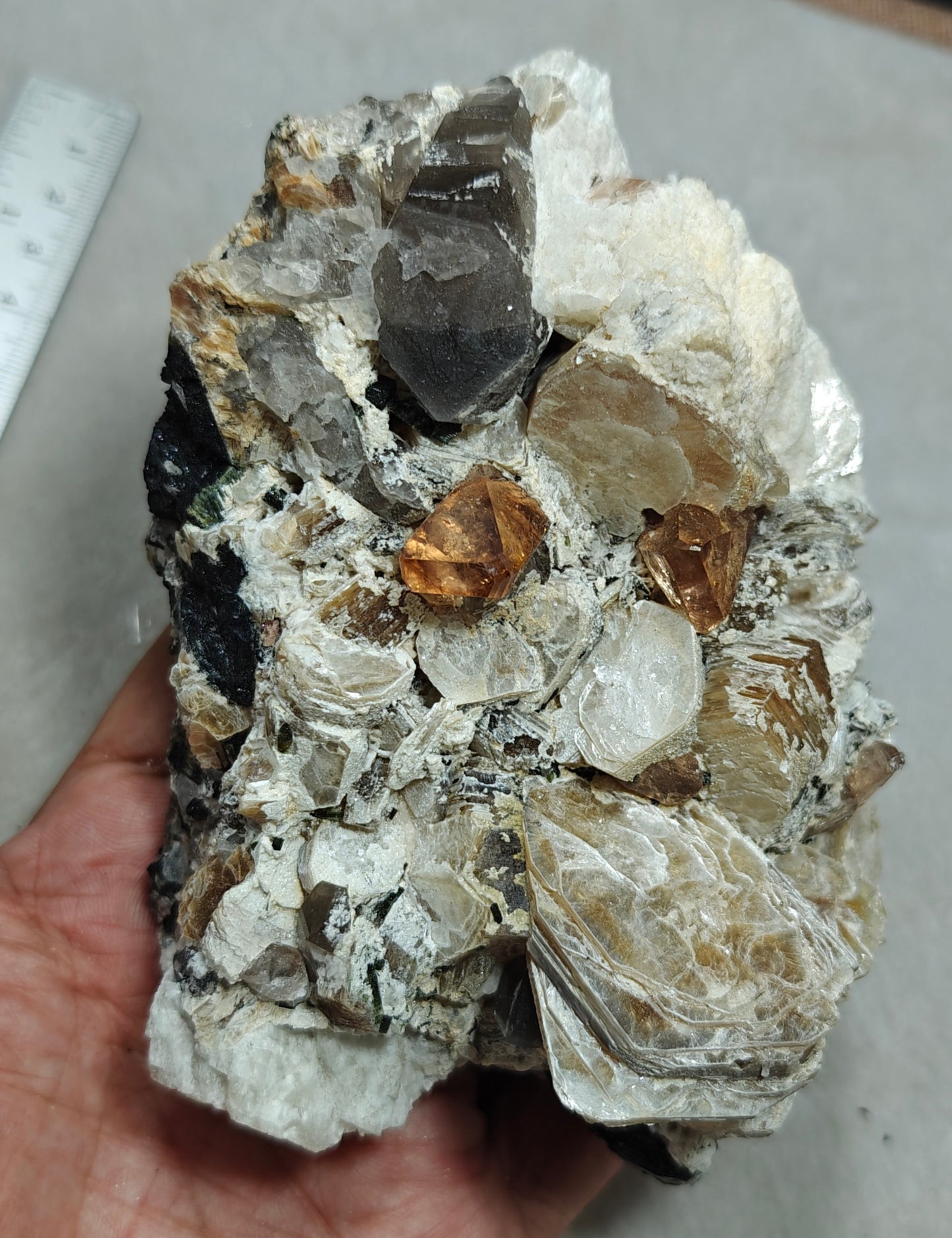 peach color Topaz crystals on matrix 686 grams