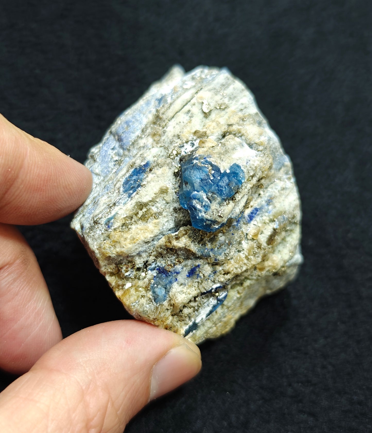 Afghanite Fluorescent in matrix with some pyrite 190 grams