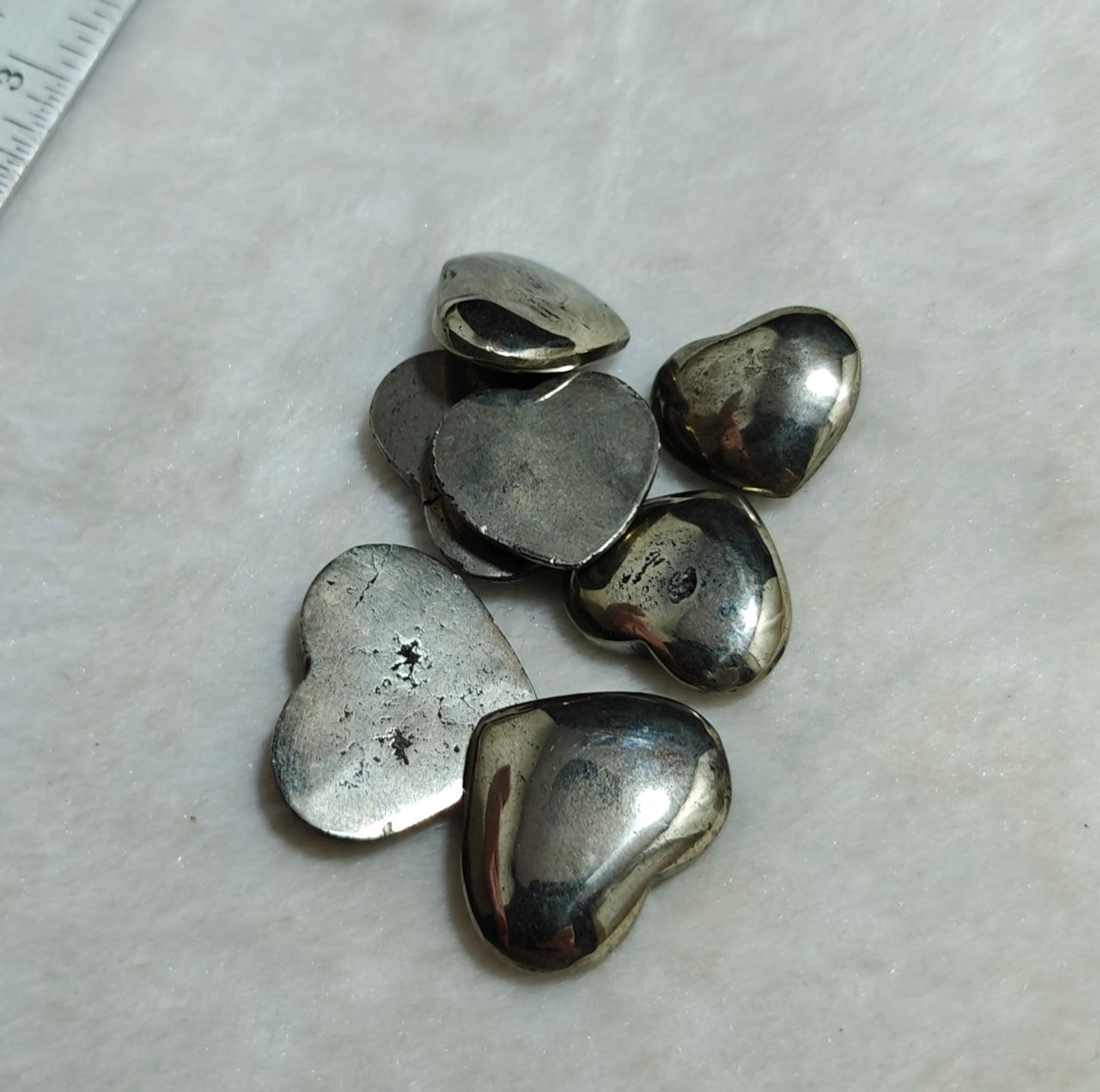 7 pyrite carvings heart shapes