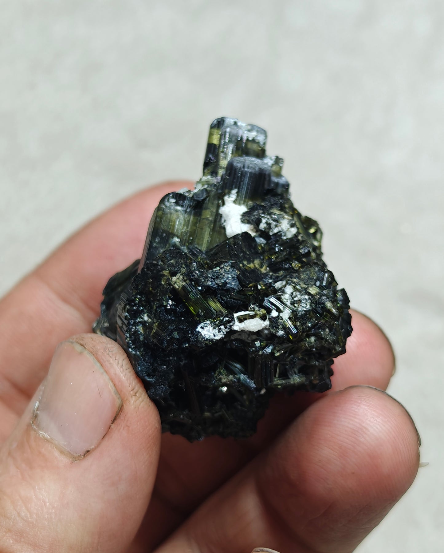 Dark green color Tourmaline crystal with chatoyance effect 50 grams