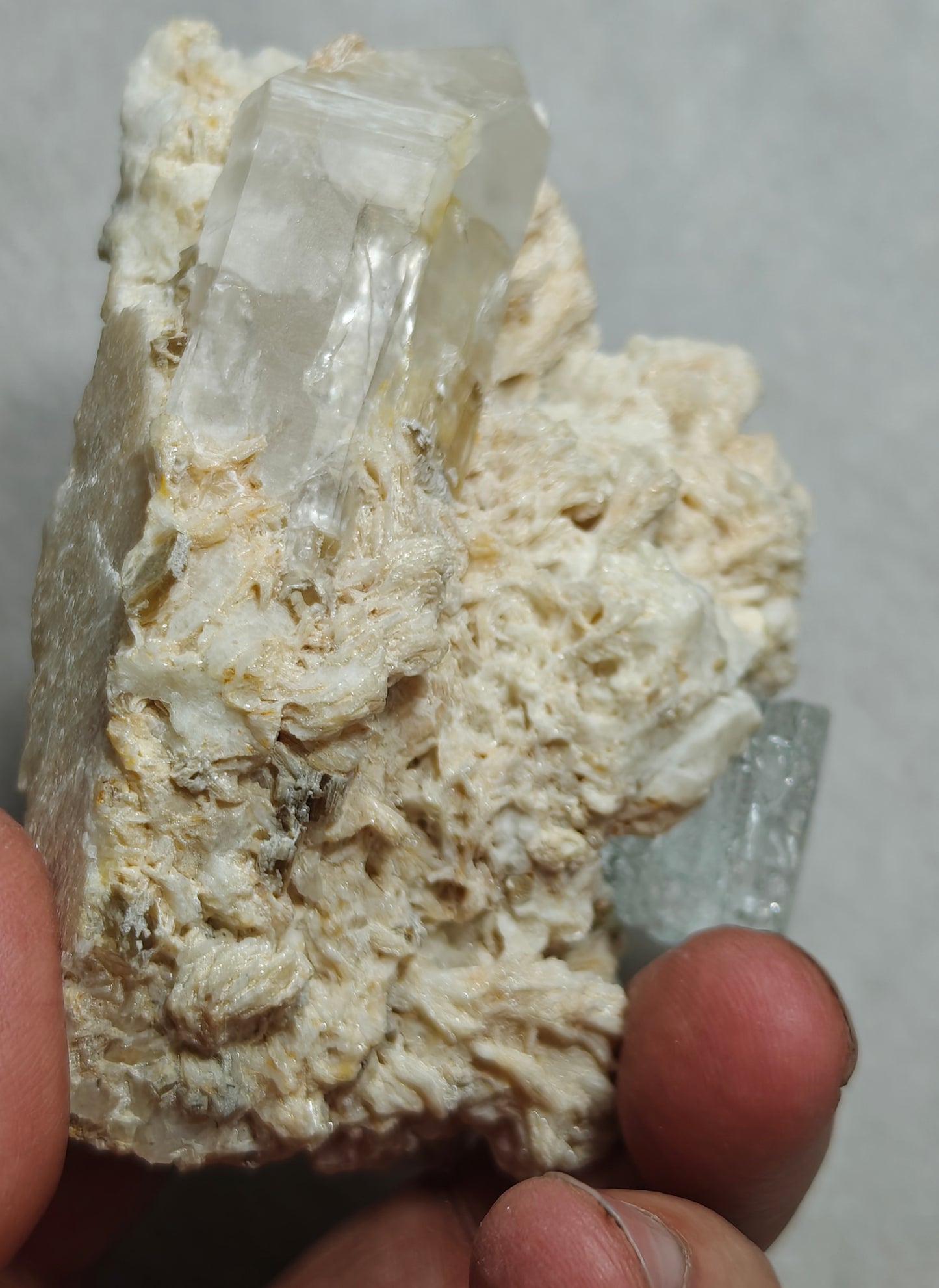 An aesthetic Specimen of etched Aquamarine on matrix with quartz 206 grams