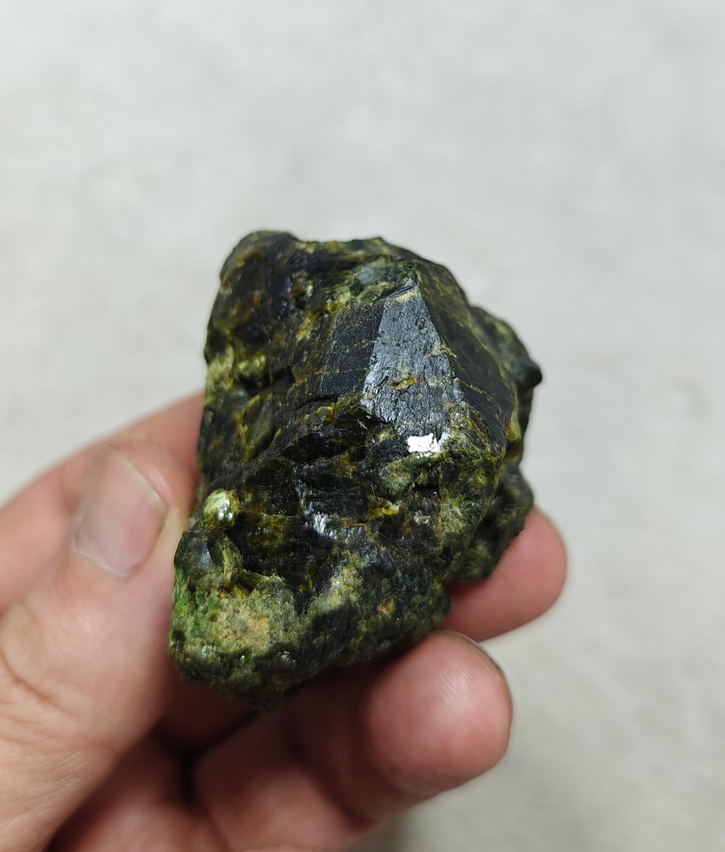 Natural green garnet variety demantoid crystal 142 grams