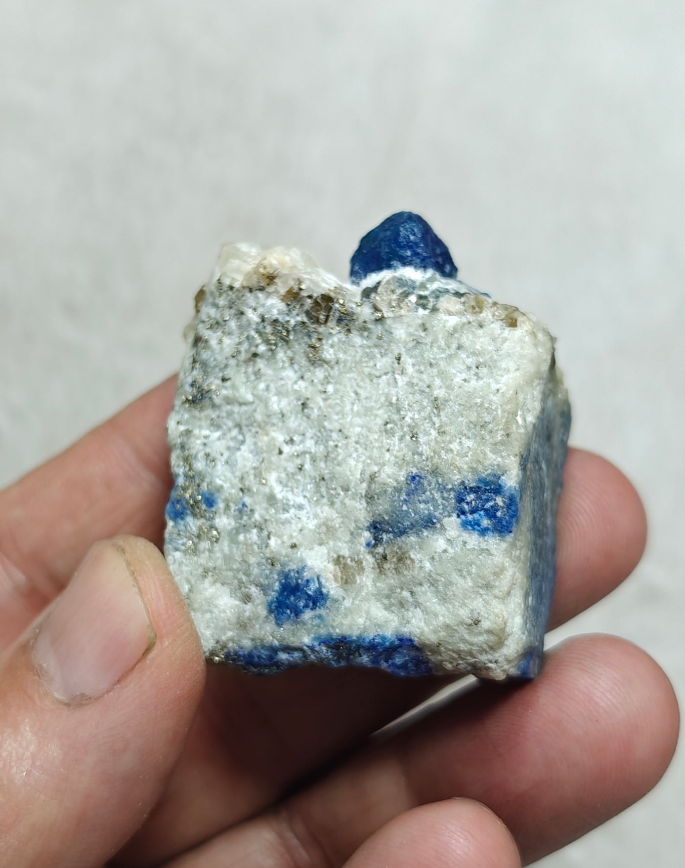 Fluorescent Afghanite/lazurite on matrix with pyrite 58 grams