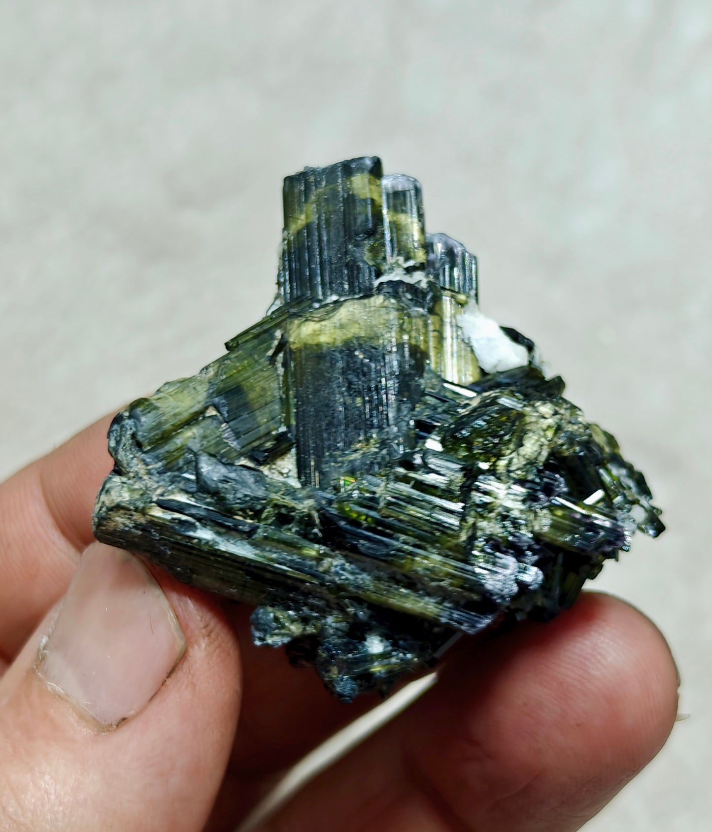 Dark green color Tourmaline crystal with chatoyance effect 50 grams
