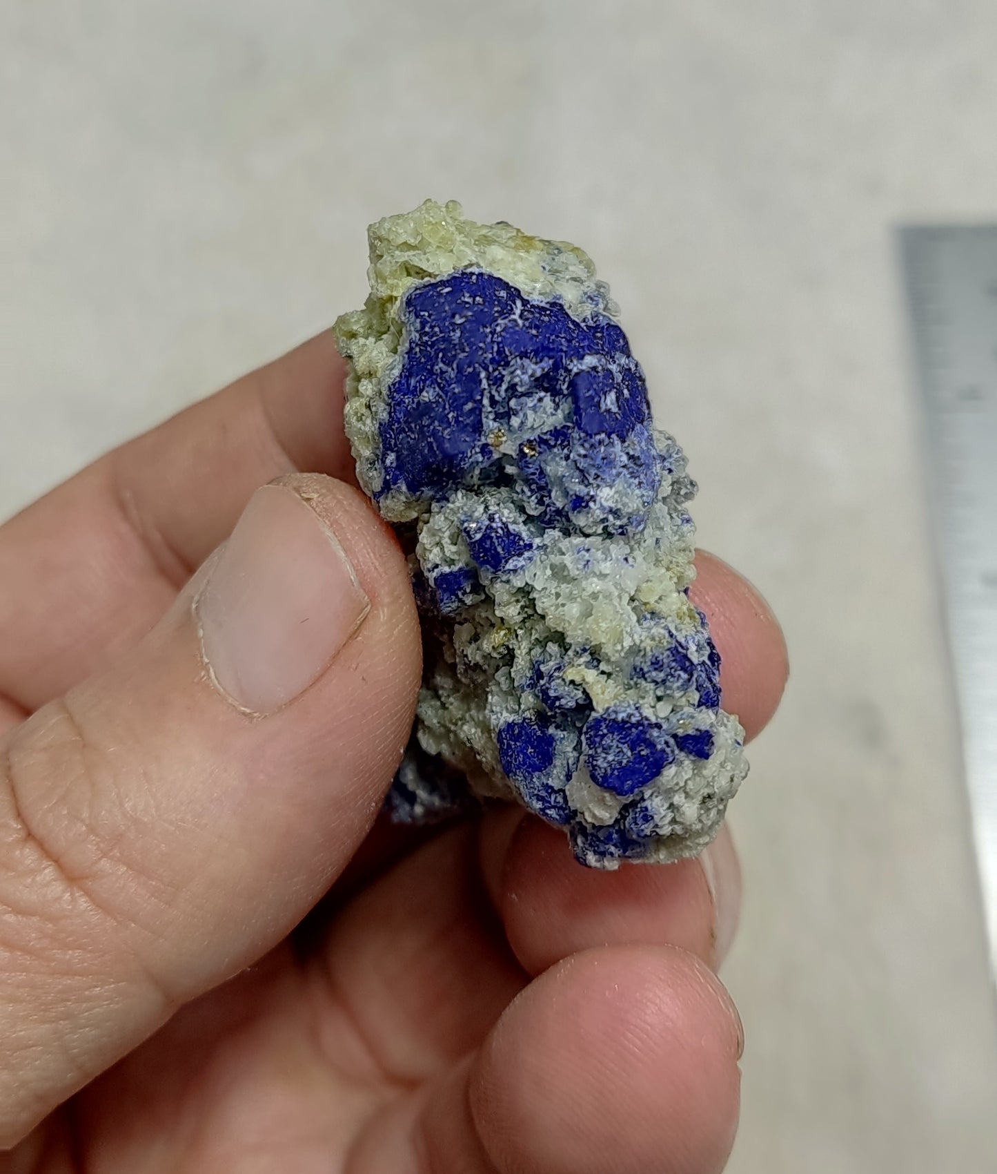 Lazurite in Matrix Partly Fluorescent 38 grams