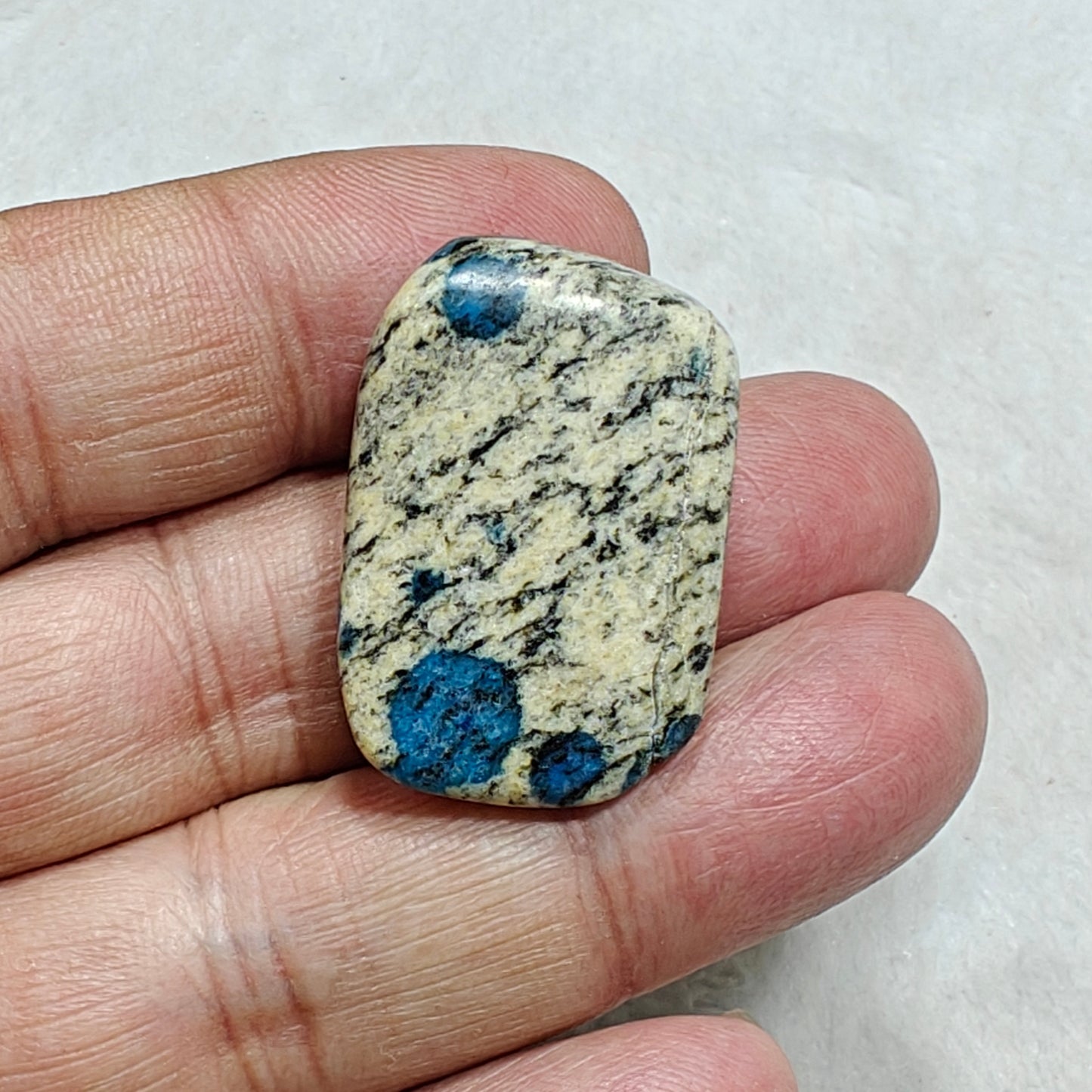 3 Natural K2 stone tumbles also known as Azurite in granite