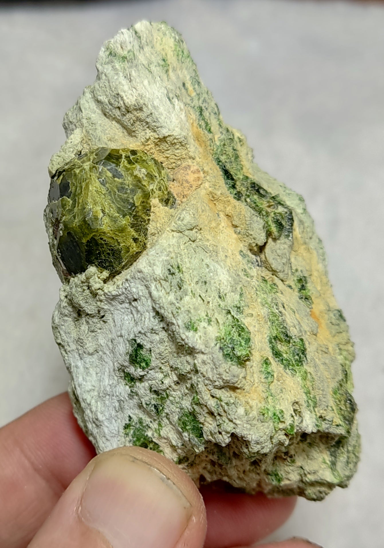 An Aesthetic specimen of garnet variety demantoid crystal On Matrix 140  grams