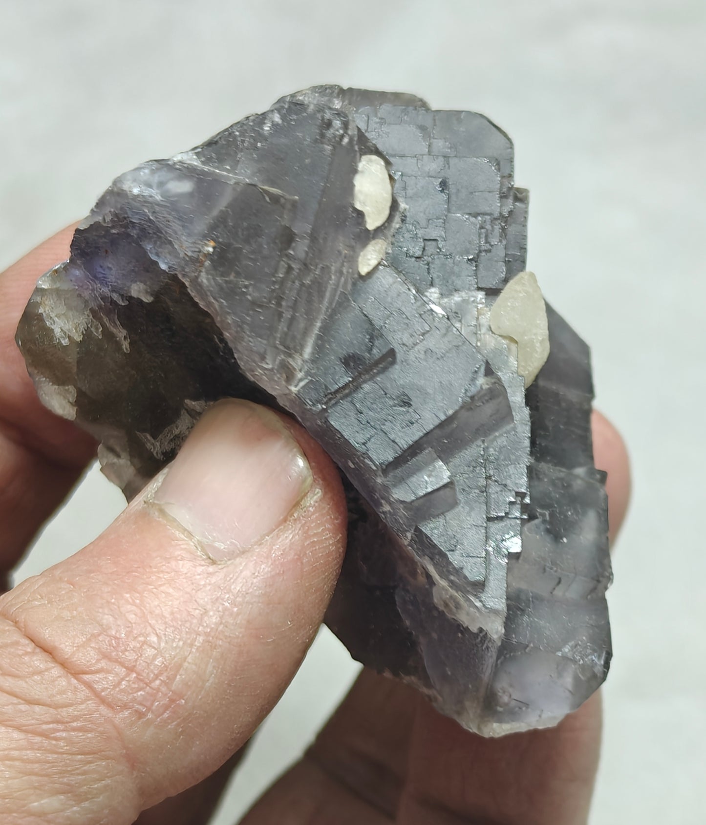 An amazing Single beautiful specimen of grey/purple fluorite with calcite crystals 150 grams