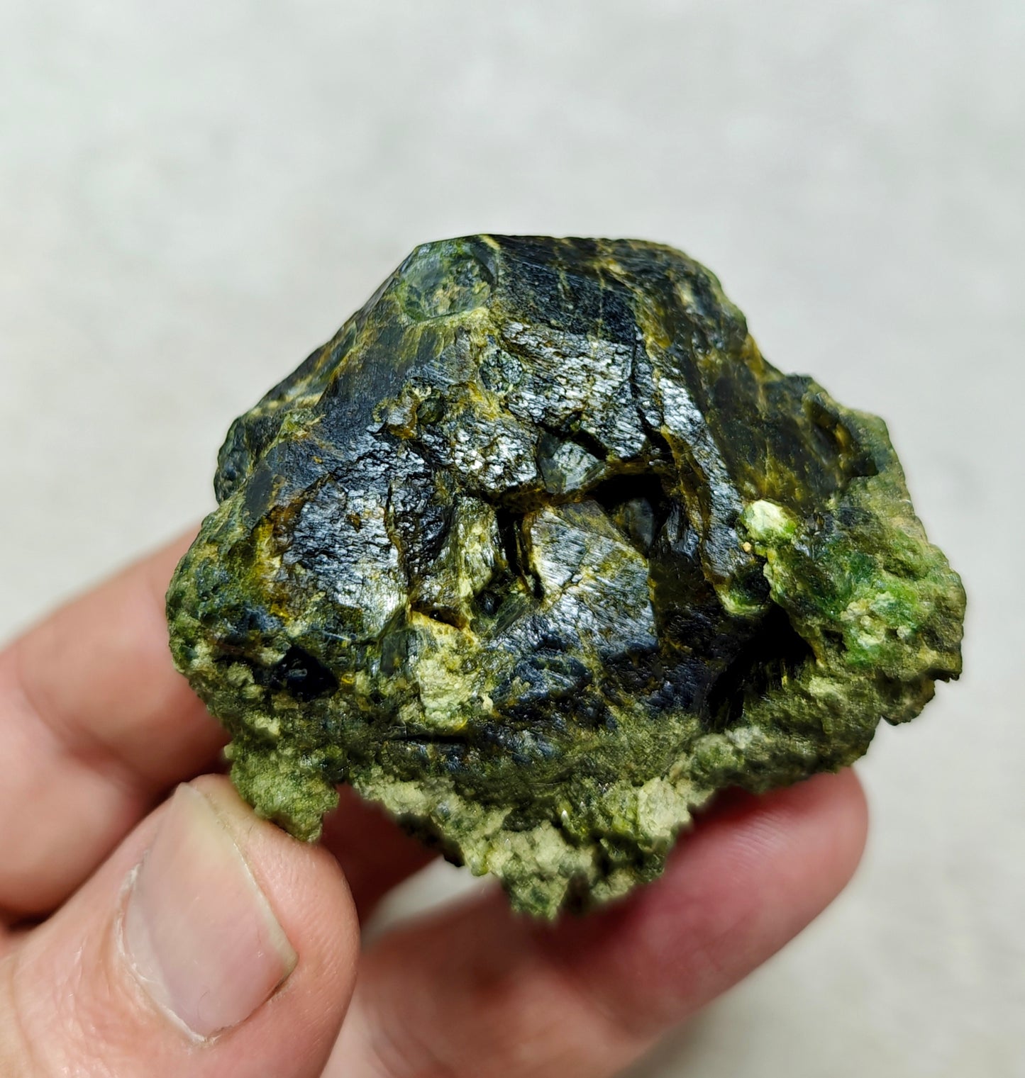 Natural green garnet variety demantoid crystal 142 grams