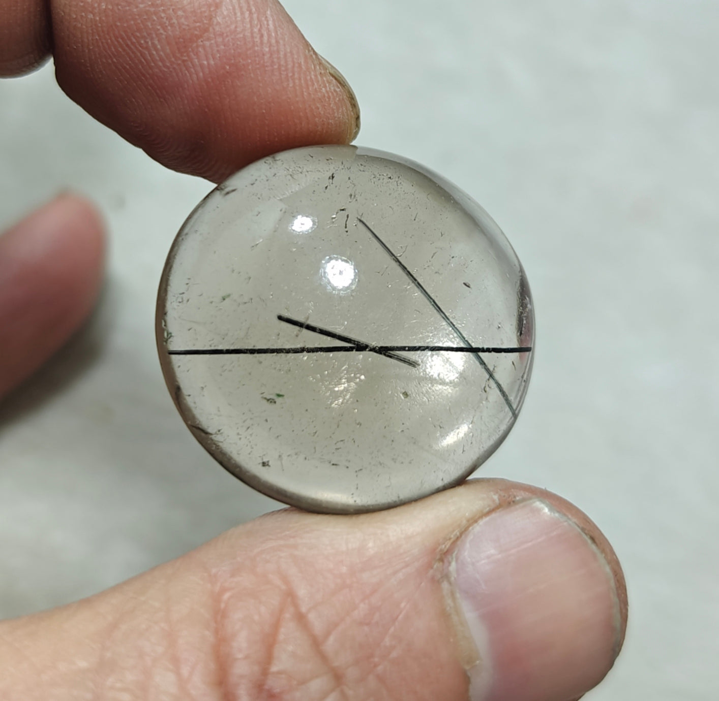 Tourmaline included smoky Quartz cabochon 64 carats