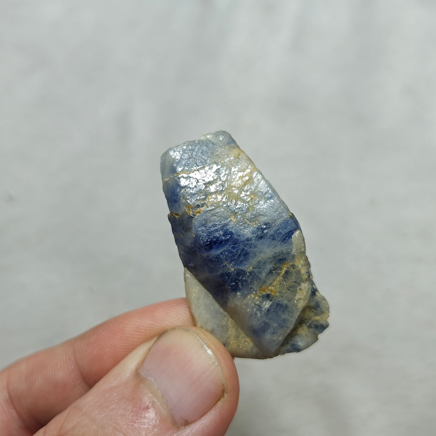 Natural Terminated blue sapphire crystal with some matrix 24 grams