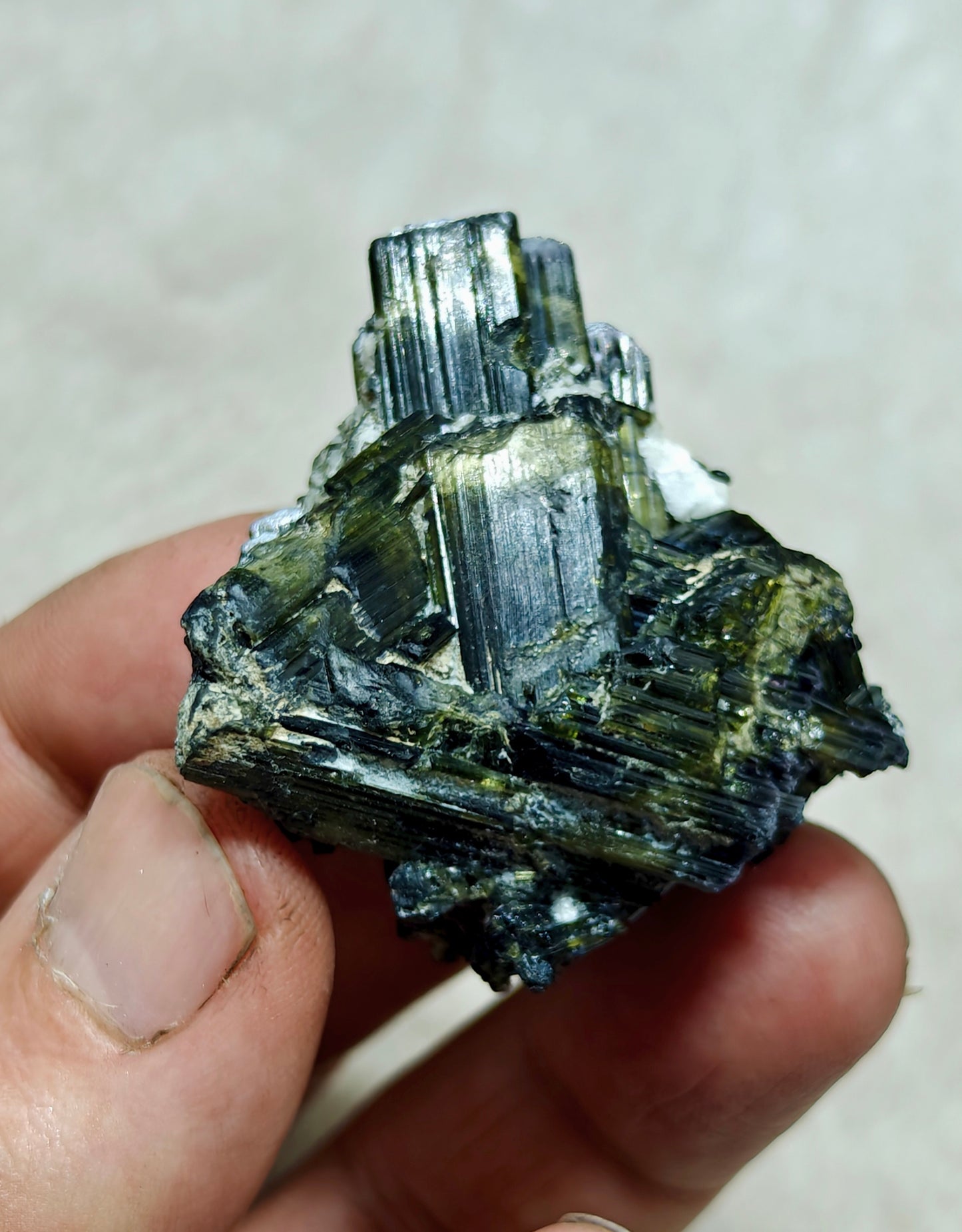 Dark green color Tourmaline crystal with chatoyance effect 50 grams