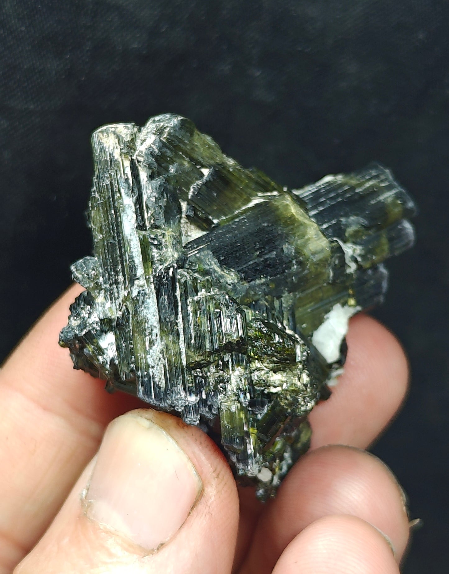Dark green color Tourmaline crystal with chatoyance effect 50 grams