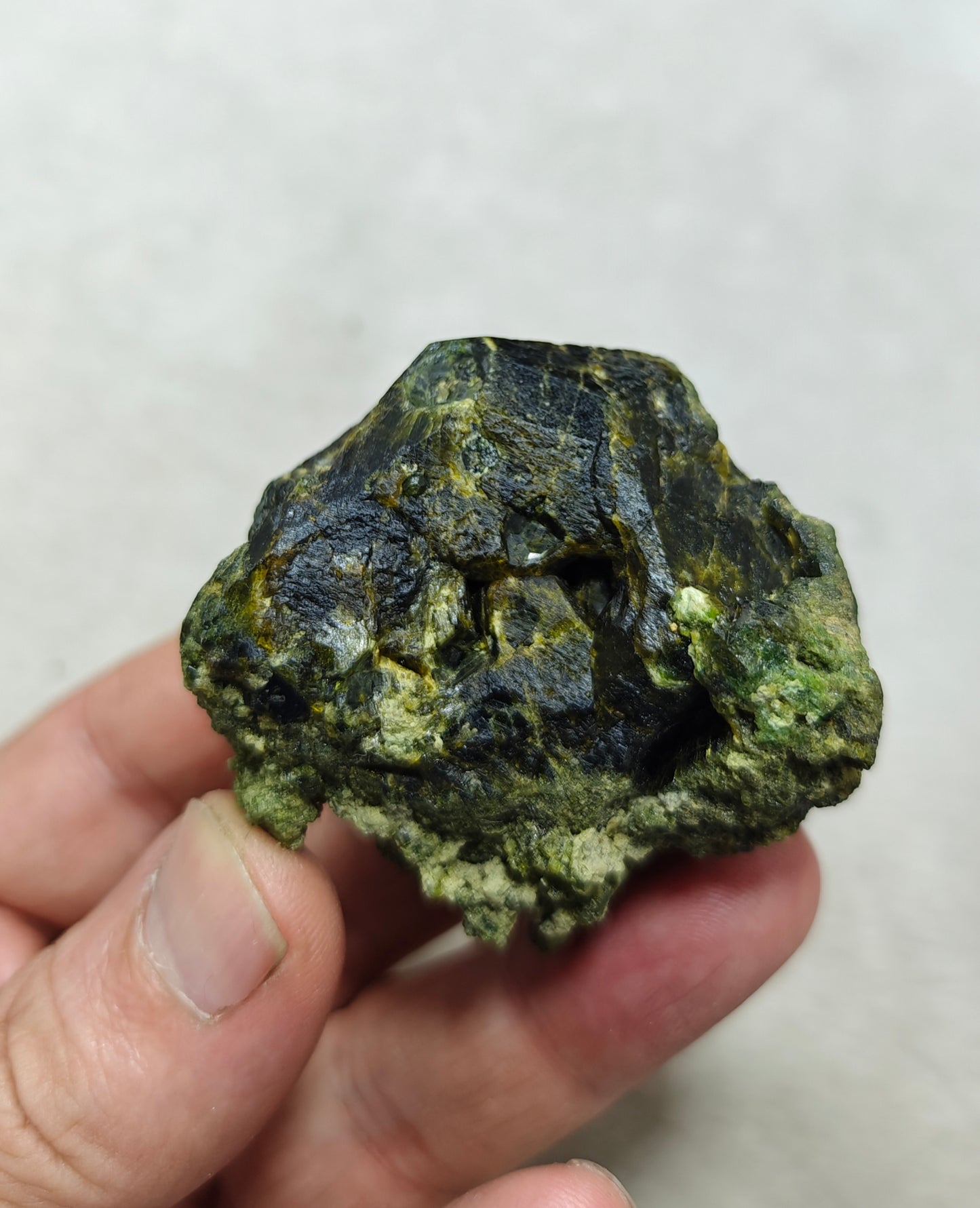 Natural green garnet variety demantoid crystal 142 grams