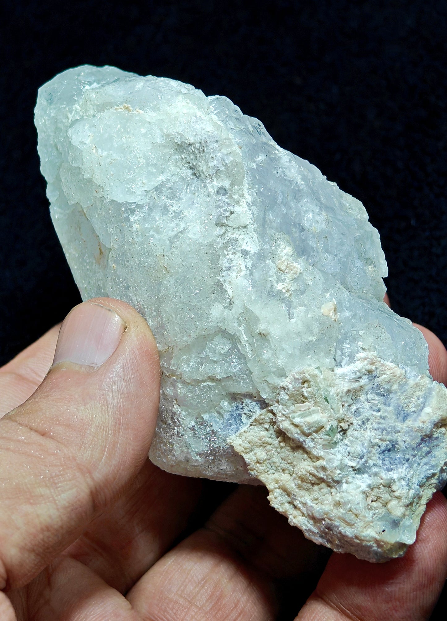 Natural etched pollucite with green tourmalines 260 grams