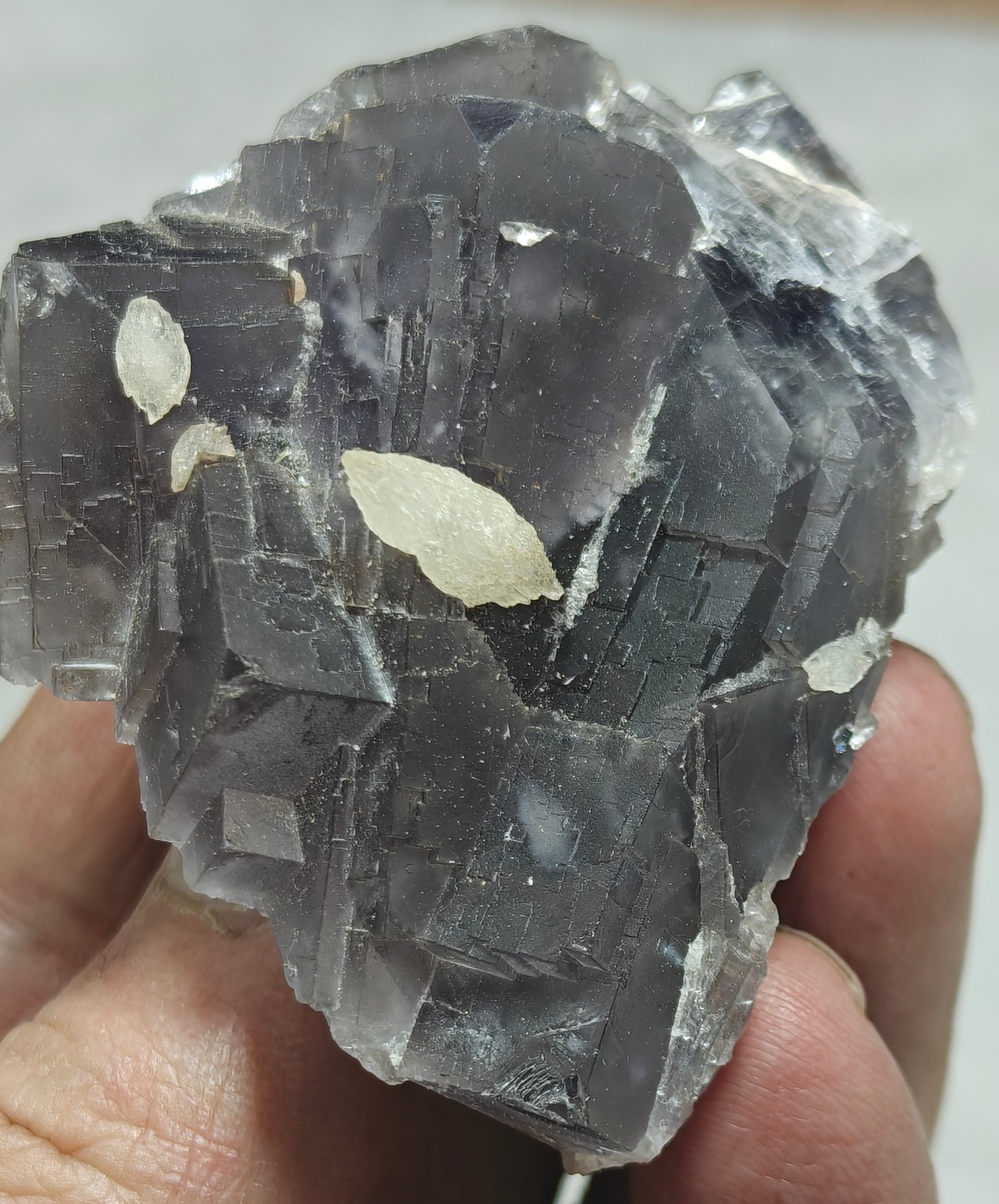 An amazing Single beautiful specimen of grey/purple fluorite with calcite crystals 150 grams