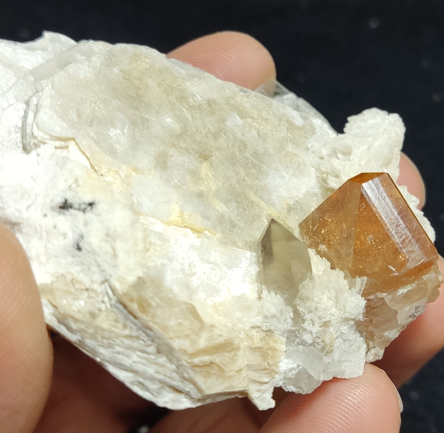 An amazing Specimen of terminated peach color Topaz crystal embedded in muscovite 48 grams
