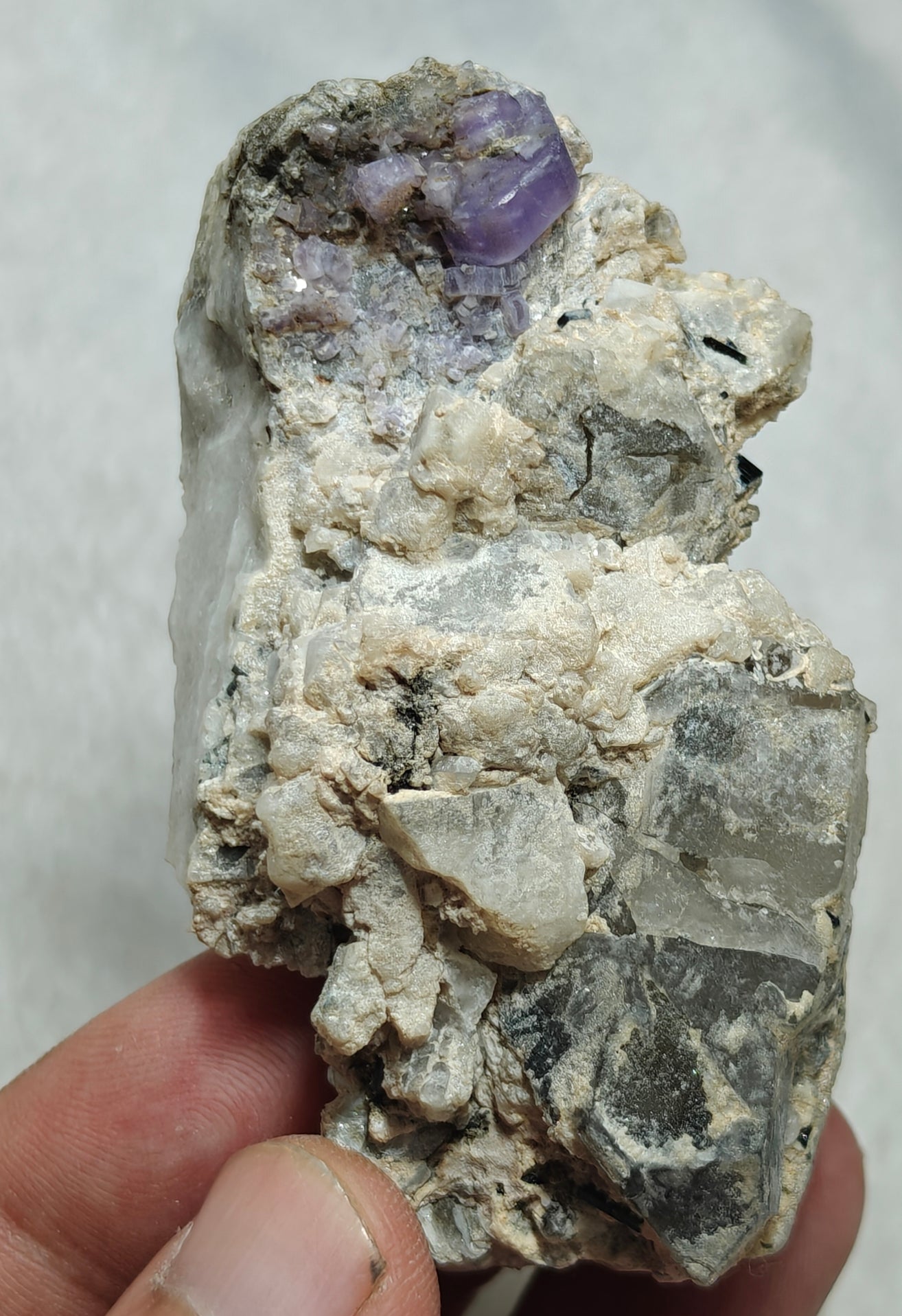 An amazing specimen of purple Apatite crystals on matrix 120 grams