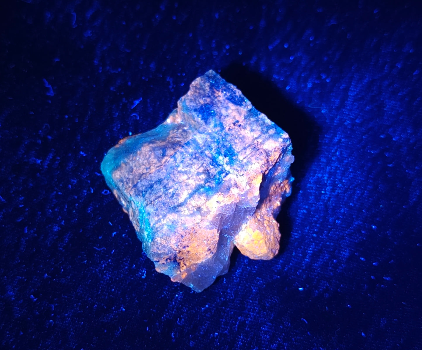 Fluorescent Afghanite/lazurite on matrix with pyrite 58 grams