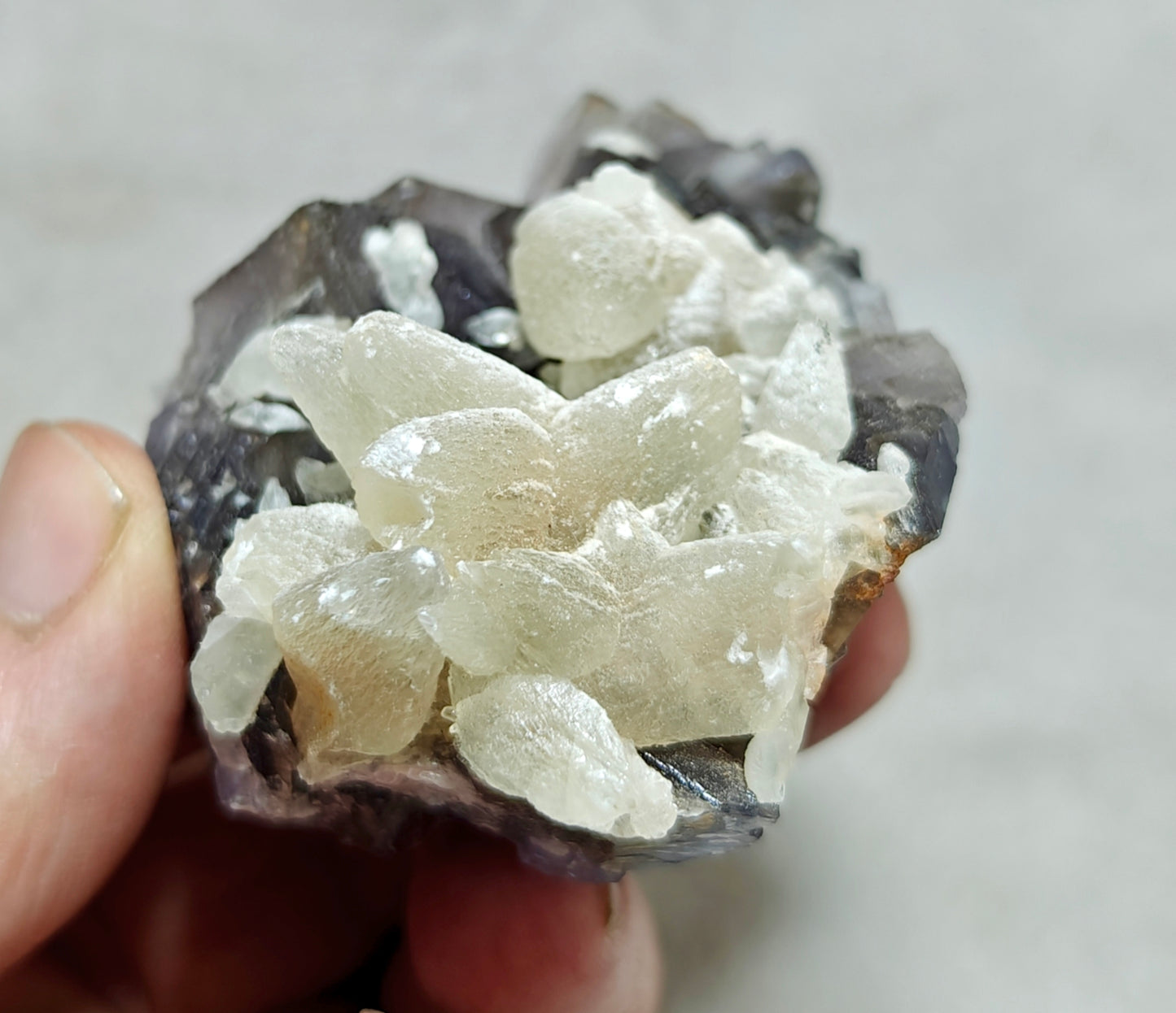 An amazing Single beautiful specimen of grey fluorite with calcite crystals 165 grams