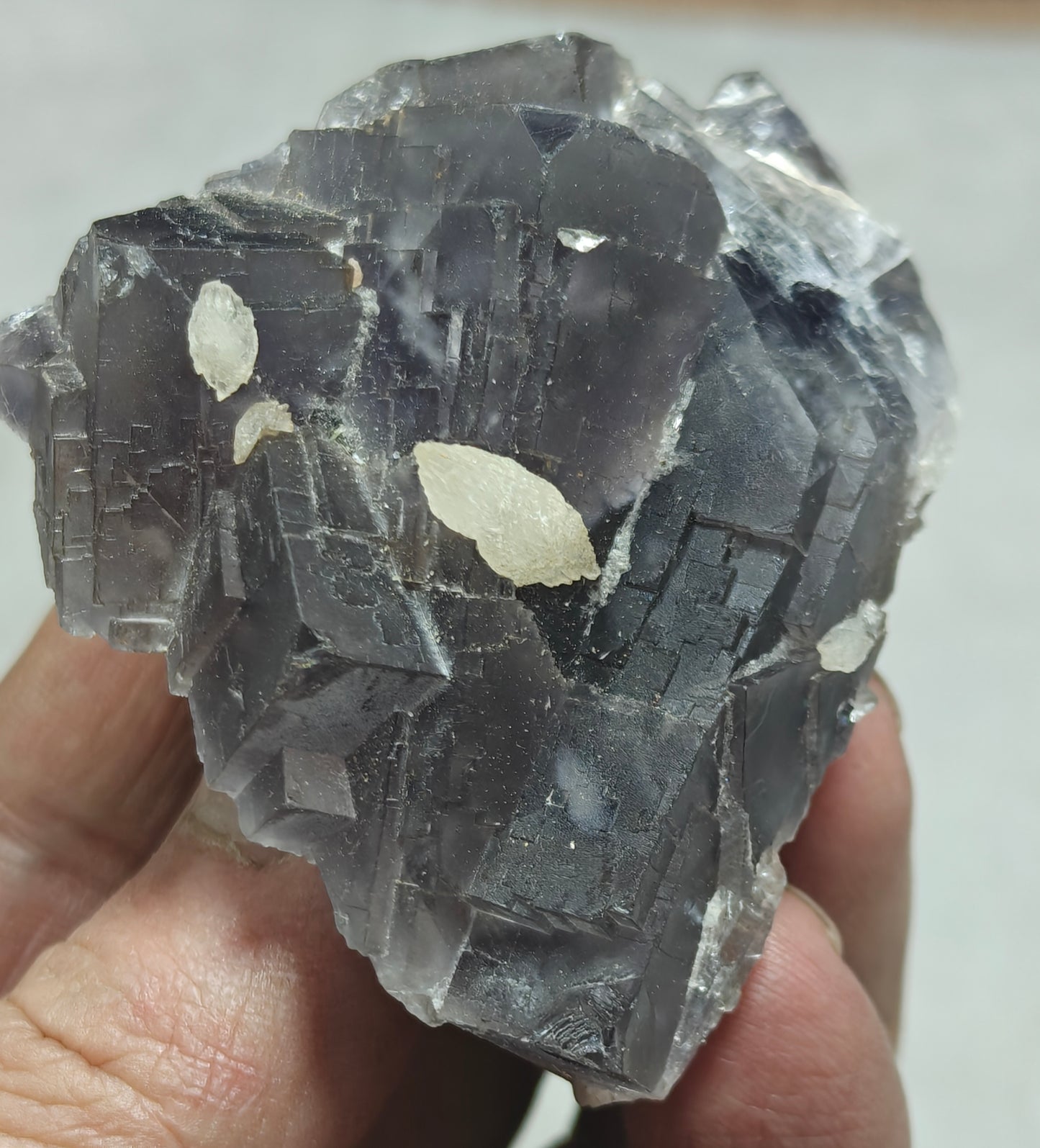An amazing Single beautiful specimen of grey/purple fluorite with calcite crystals 150 grams