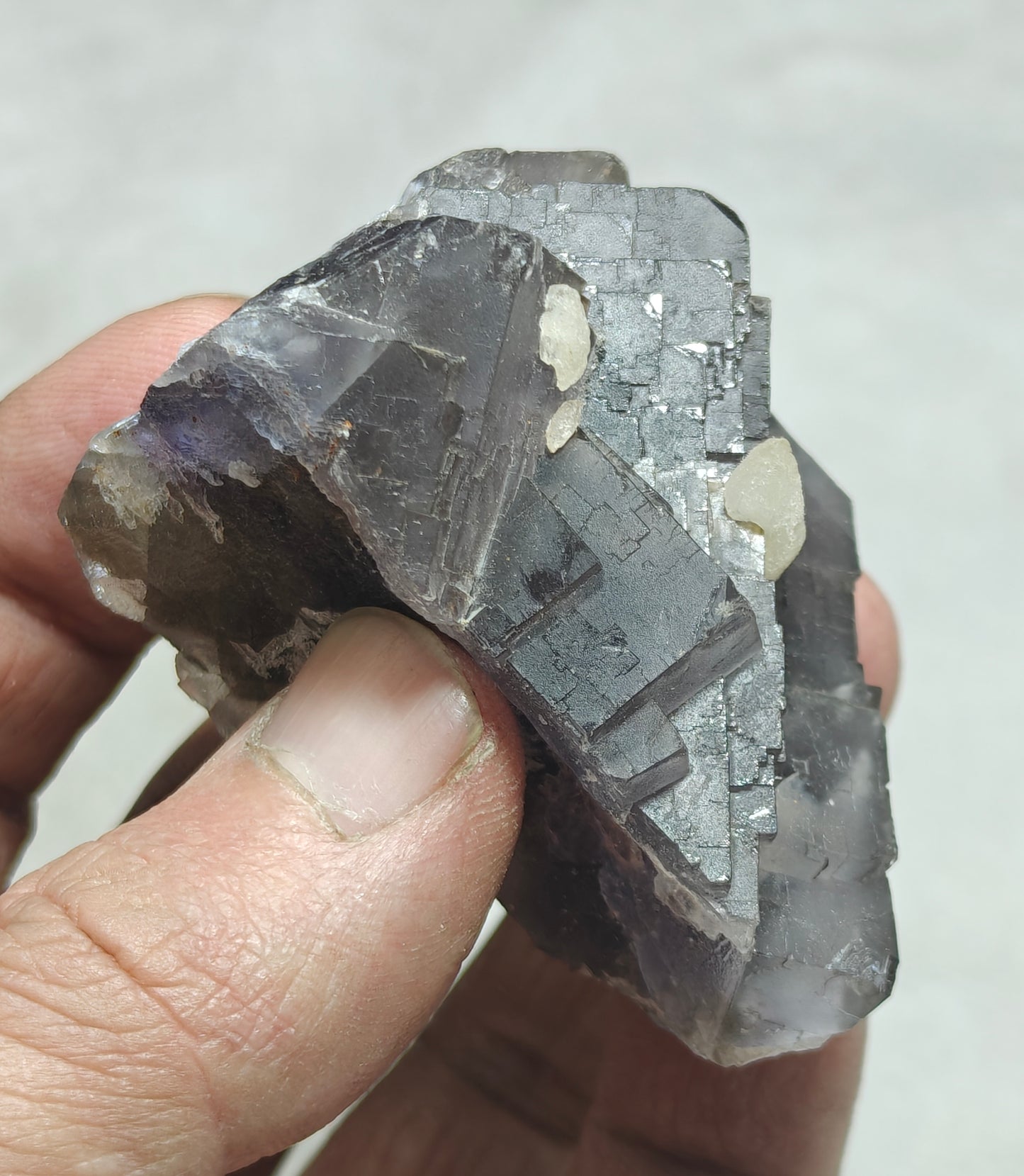 An amazing Single beautiful specimen of grey/purple fluorite with calcite crystals 150 grams