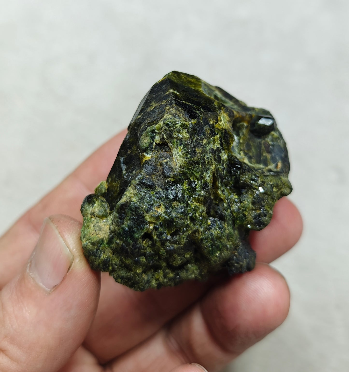 Natural green garnet variety demantoid crystal 142 grams