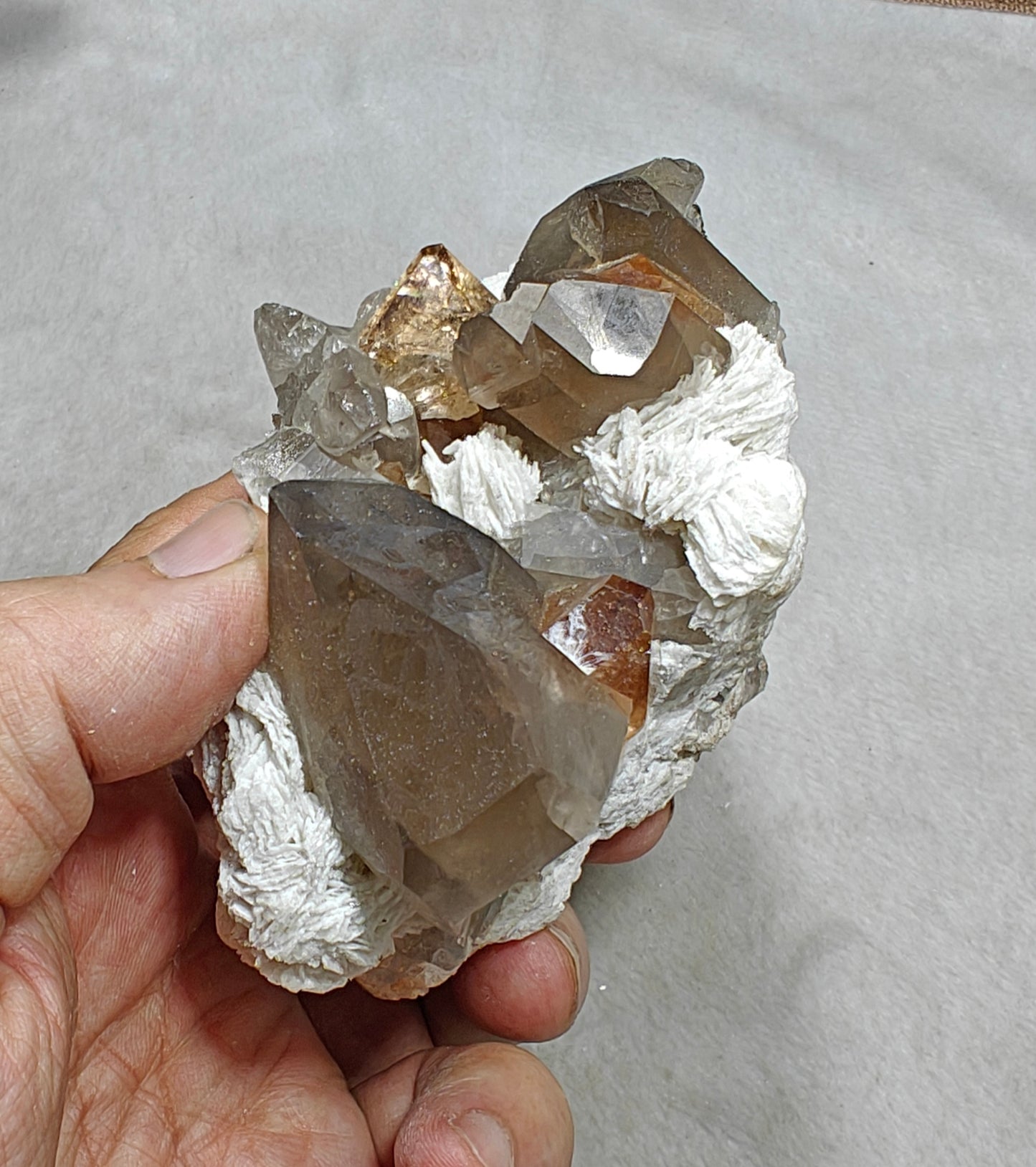 Natural peach color Topaz crystals on matrix with smoky quartz 455 grams