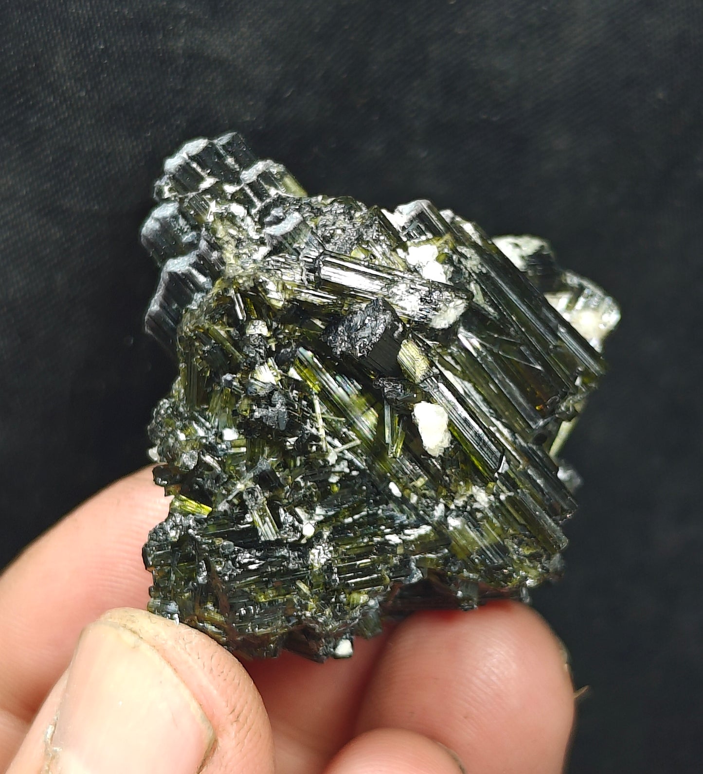 Dark green color Tourmaline crystal with chatoyance effect 50 grams