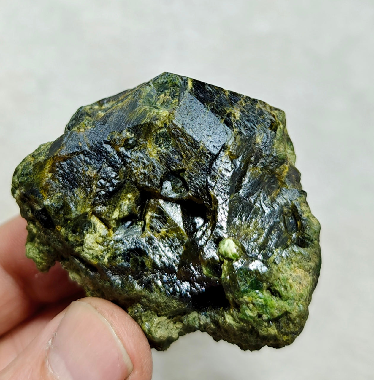 Natural green garnet variety demantoid crystal 142 grams