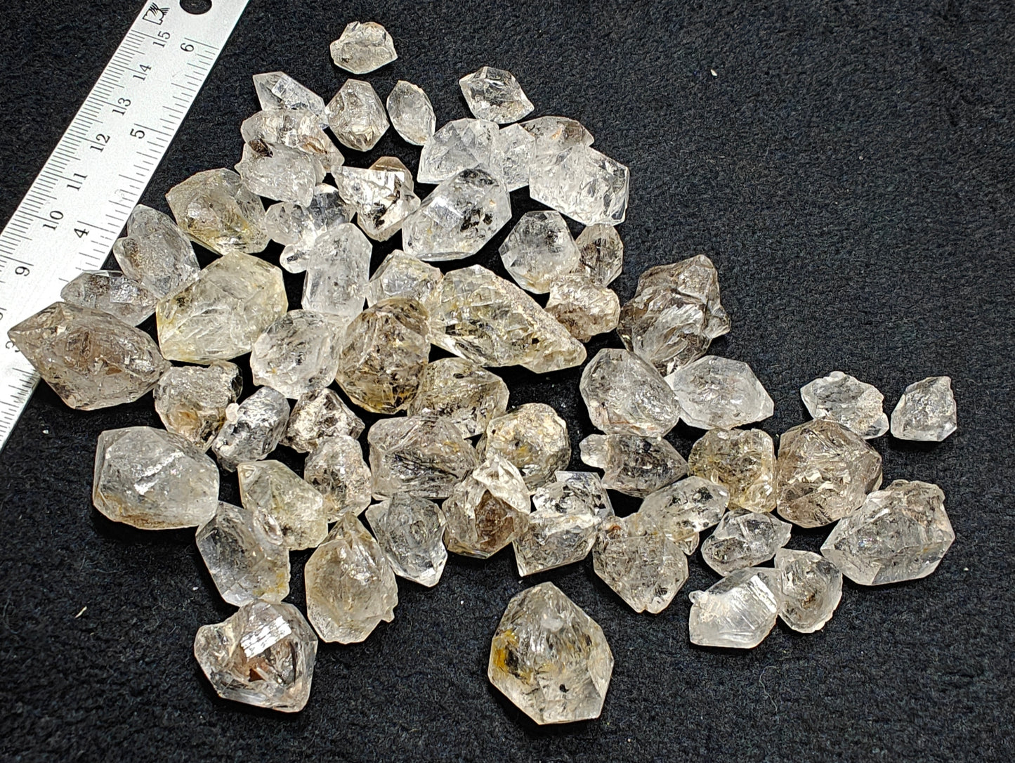 220 grams diamond quartz crystals some with carbon inclusions