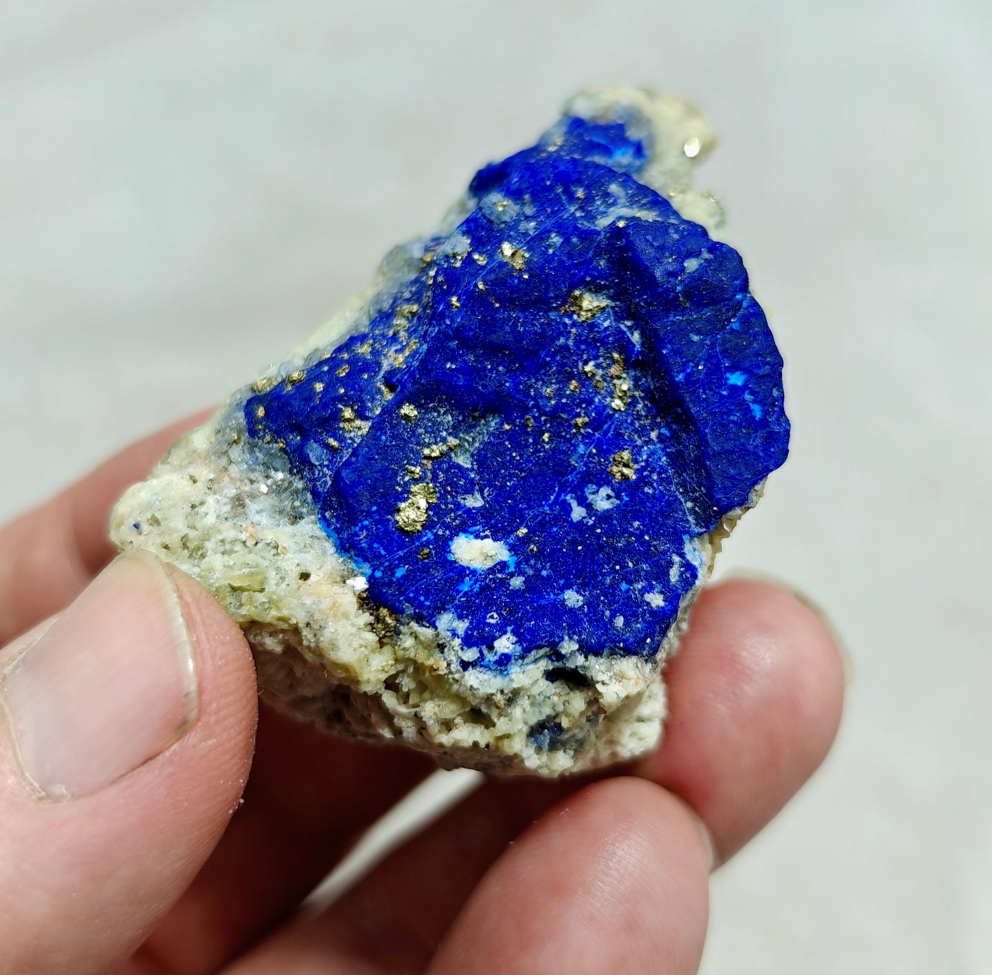An Aesthetic specimen of Lazurite Lapis with Pyrite partly fluorescent 57g
