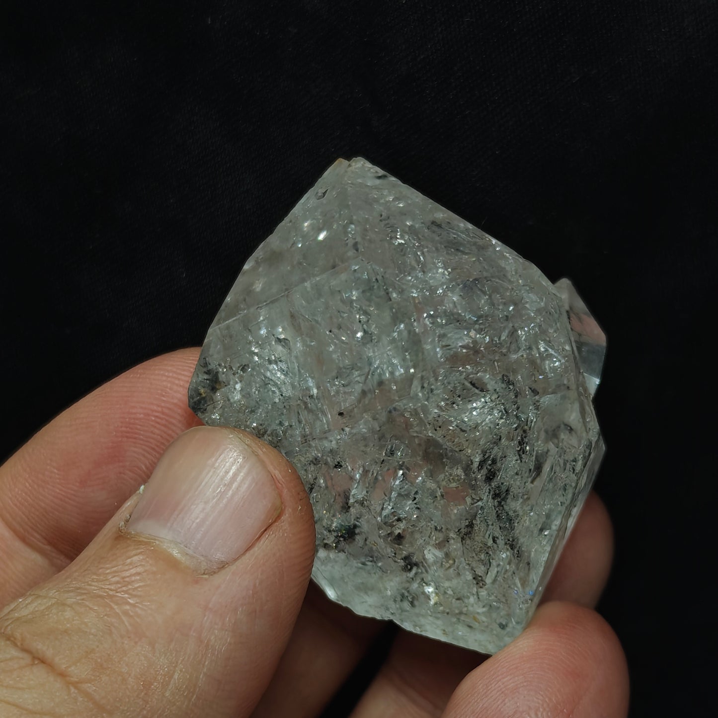 double terminated diamond like quartz crystal with carbon inclusions 57 grams