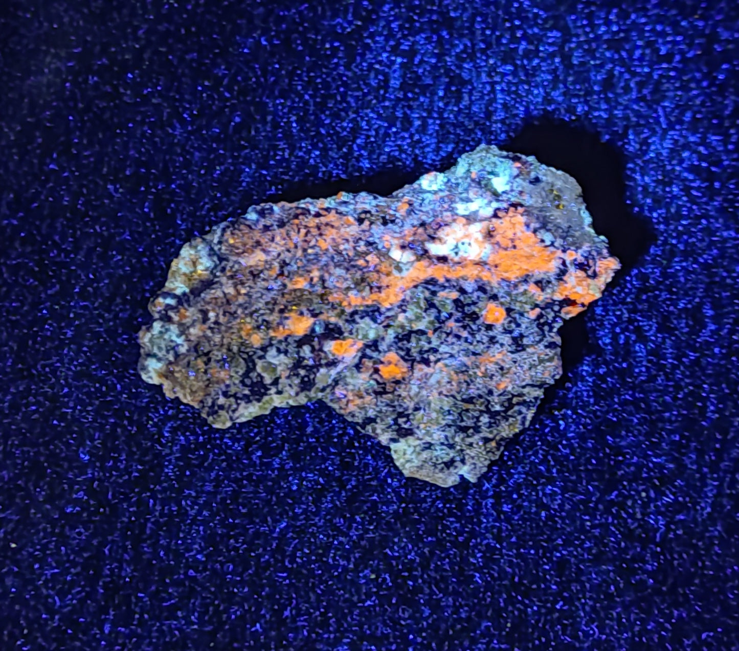 Partly Fluorescent natural lazurite with Pyrite 47 grams