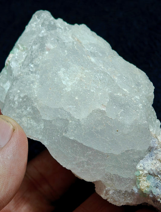 Natural etched pollucite with green tourmalines 260 grams