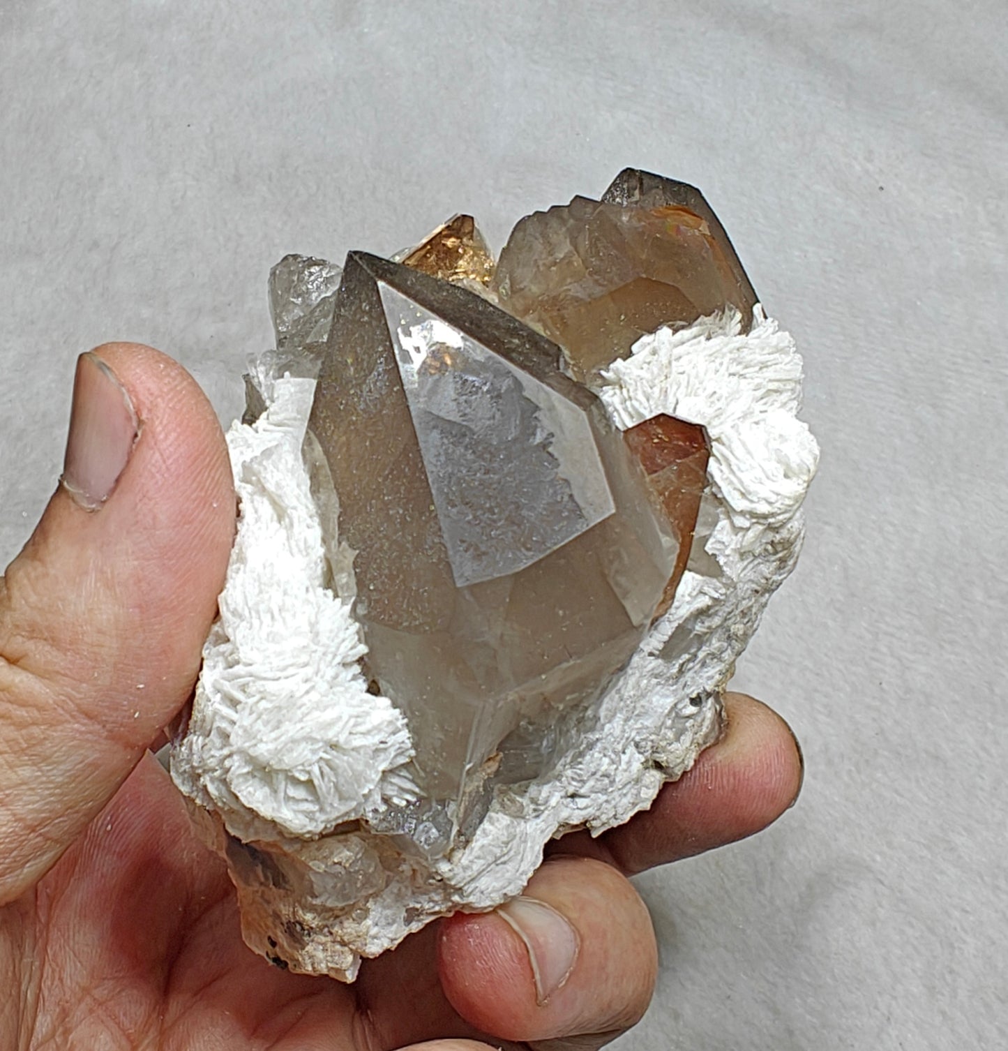 Natural peach color Topaz crystals on matrix with smoky quartz 455 grams