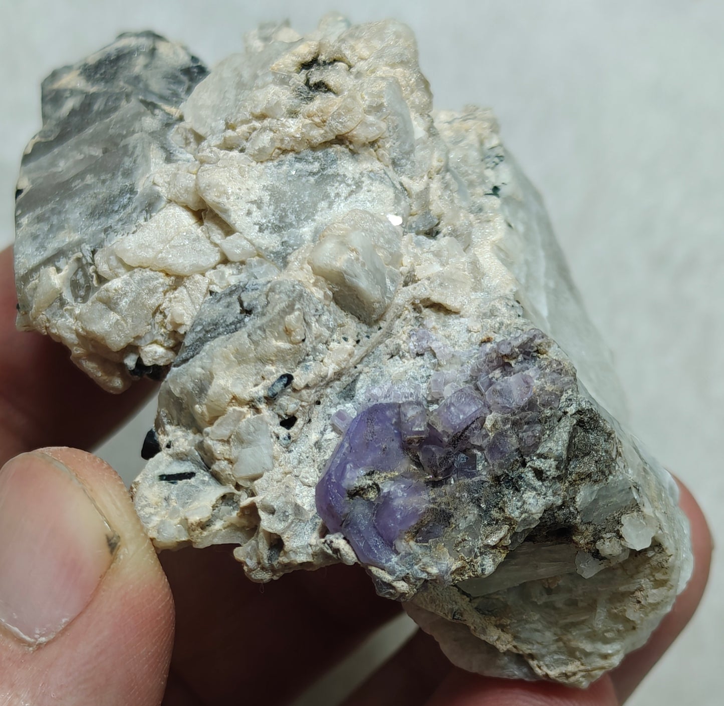 An amazing specimen of purple Apatite crystals on matrix 120 grams