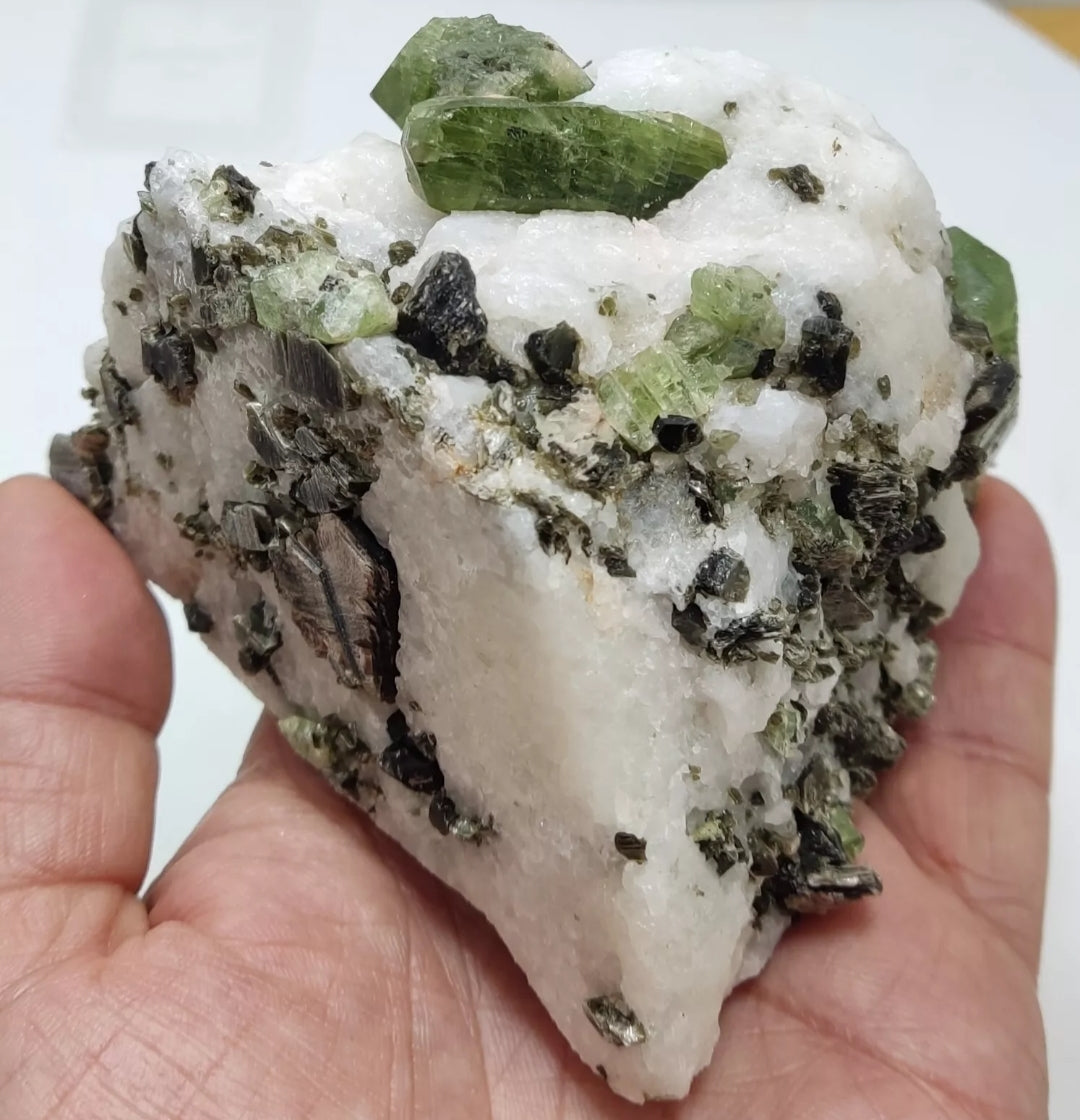 Diopside crystals on matrix with black/dark brown mica 811 grams