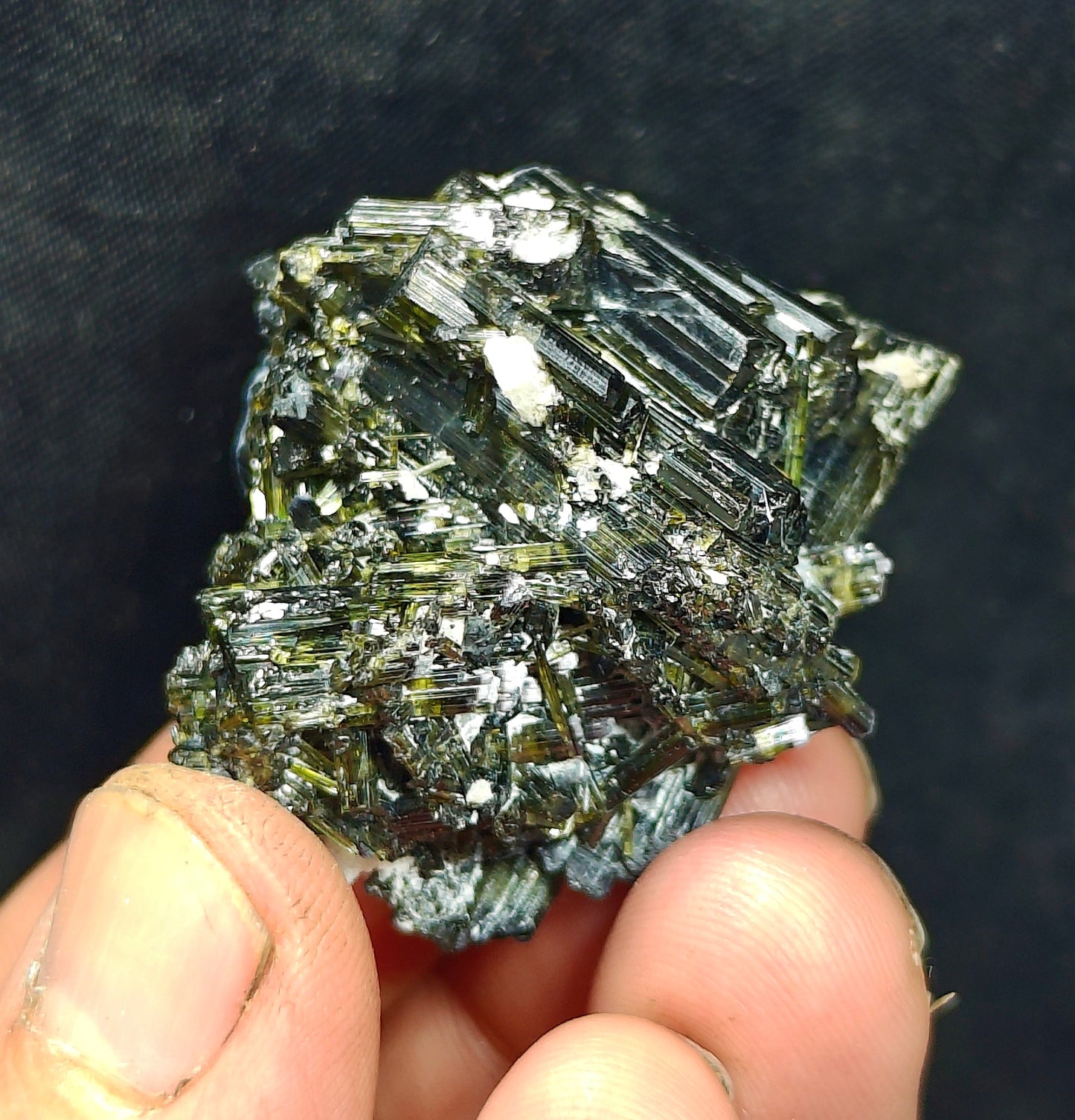 Dark green color Tourmaline crystal with chatoyance effect 50 grams