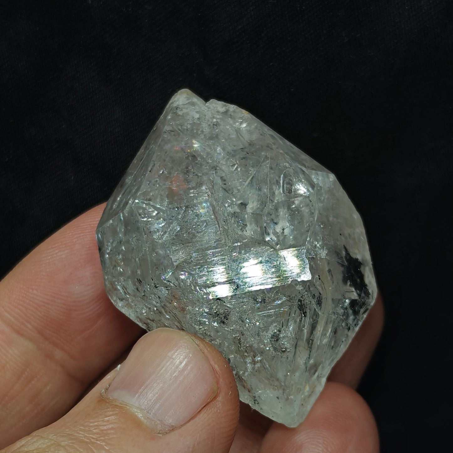 double terminated diamond like quartz crystal with carbon inclusions 57 grams