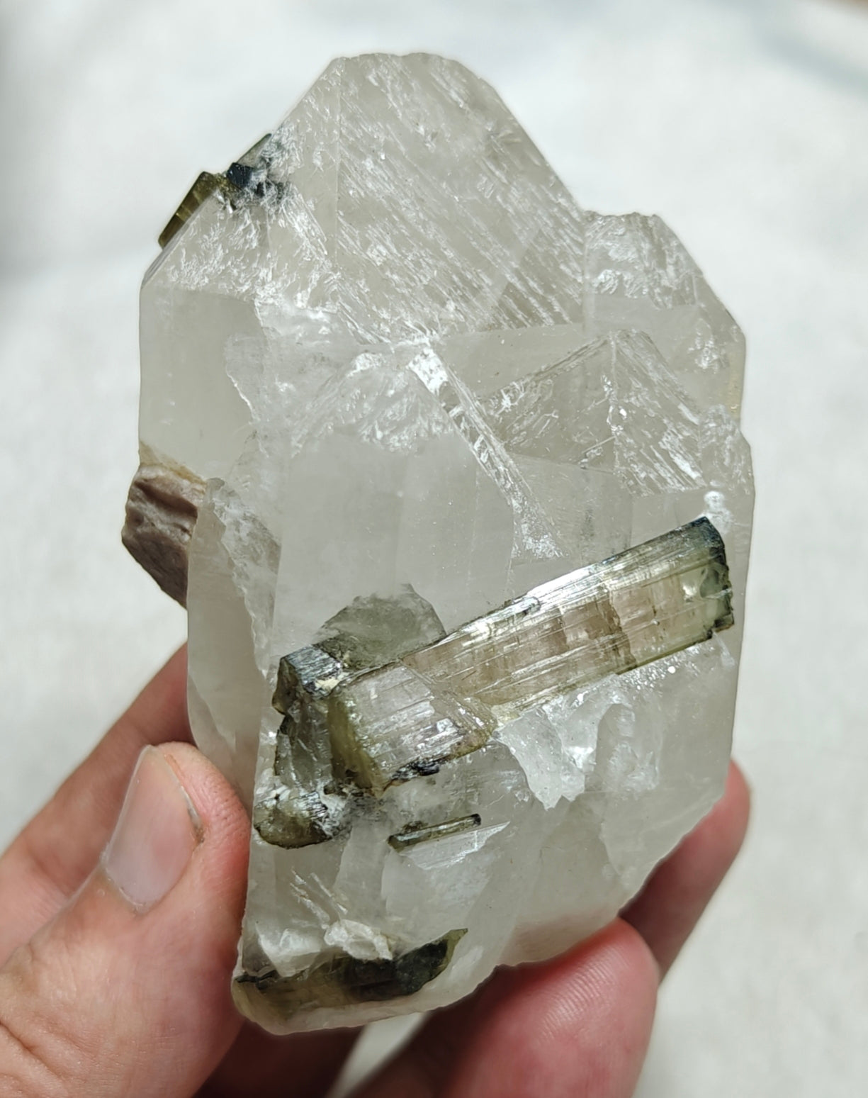 An amazing beautiful specimens of light pink and green Tourmaline embedded in terminated quartz 323g